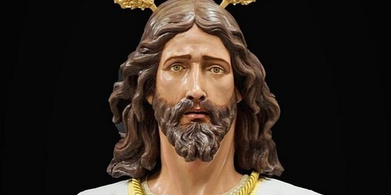 El Santísimo Cristo de la Fe y la Salud procesiona el Domingo de Ramos desde el colegio Santa María del Pilar