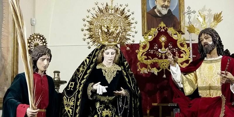 La Hermandad de la Borriquita celebra la solemnidad de Cristo Rey en San Ildefonso y Santos Niños Justo y Pastor