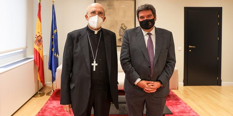 El cardenal Osoro y el ministro José Luis Escrivá hablan de exclusión social y de migraciones