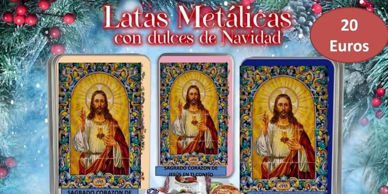 La Guardia de Honor del Corazón de Jesús pone a la venta latas metálicas rellenas de dulces navideños de Estepa